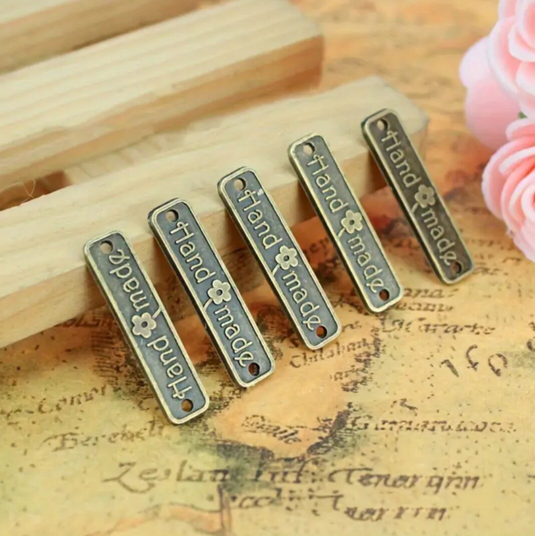 Ετικέτα μπρονζέ handmade (2x0.5cm) 77